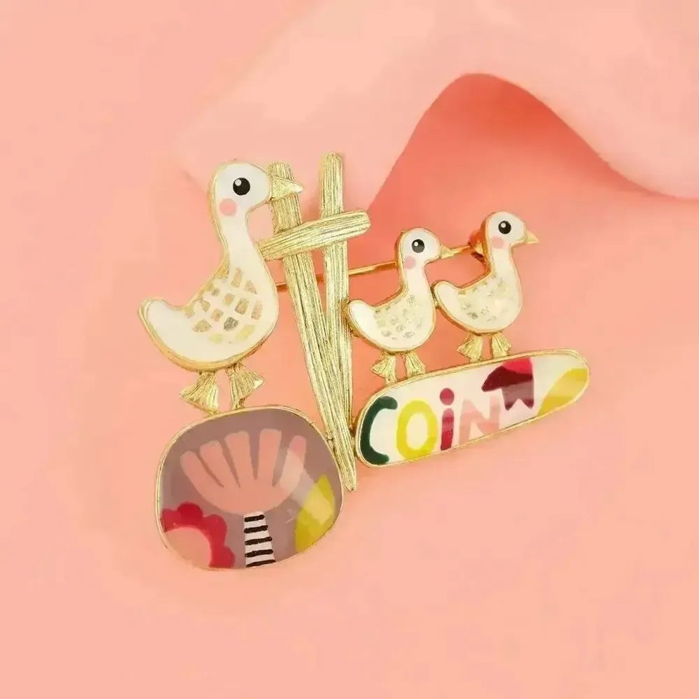 Bijoux - BROCHE PLUME COULEUR DORE MULTI - ILARIA.I